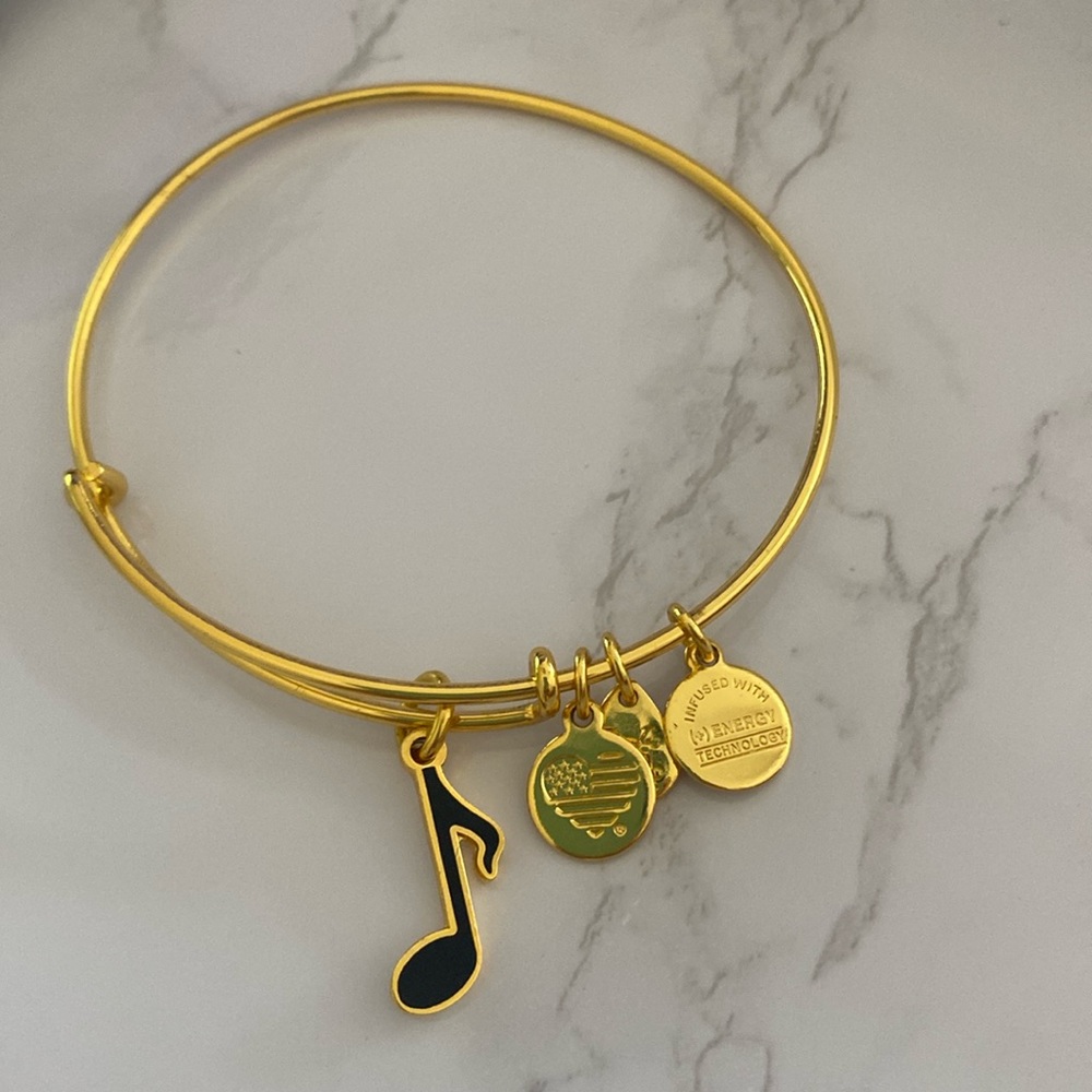 Alex and Ani gold bracelet with black music note